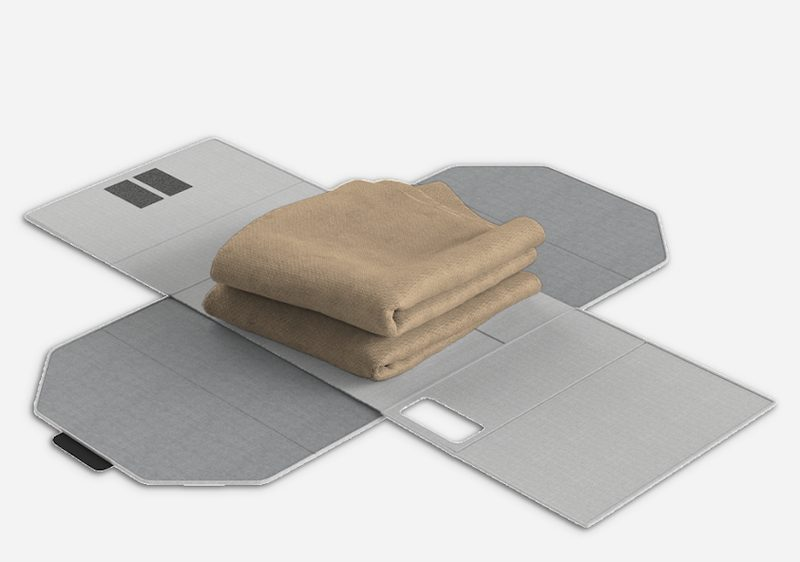 Bed sheet organizer expanded flat with folded sheets placed inside